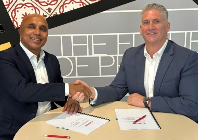 Partnership: Vinent Nair (left), Smartech, signs a deal to supply thye Colorado M Series with Craig Nethercott, Canon Production Print