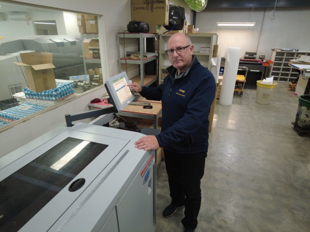 Super-efficient: Peter Pawelzig with the new Horizon SmartSlitter at Snap West Melbourne