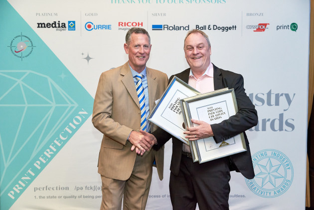 Gold: Stephen Hall from Sunprint with Tom Eckersley and the company's swag of awards