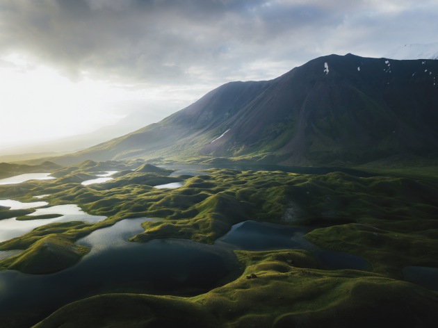 Tulparkul, Kyrgyzstan. One of my favourite images of all time. Nothing could prepare us for the otherworldly scenes of this area. When the sun burst through the clouds, I positioned the drone so the light would shine from the side and onto the mountains and lakes below. DJI Mavic Pro. 1/50s @ f2.2, ISO 118.