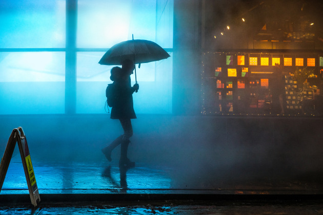 walking in the rain, night time, umbrella