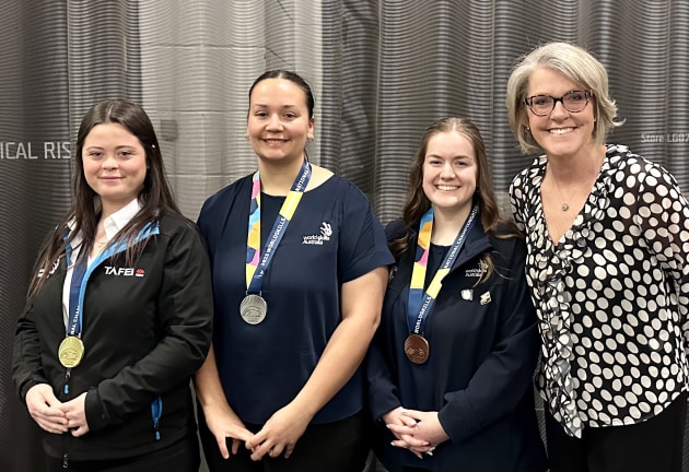 Worldskills winners: (l-r) Caitlin Wilson (Gold), Elizabeth Gasparini (Silver), and Lauren Green (Bronze), with Robyn Frampton from Visual Connections at the previous event