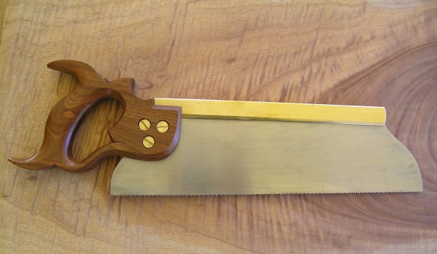 red lancewood handled saw.jpg