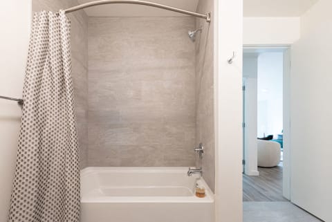 Large Bathroom Shower With Modern Details and Finishes at 10 Clay Apartments in Seattle, WA