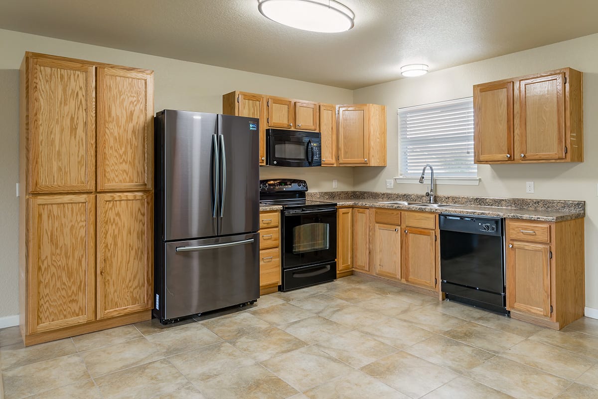 Kitchen area in a home at Gardens of Weatherford Kitchen area in a home at Gardens of Weatherford