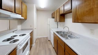 View of Kitchen in Maple floor plan at Arbors of Cleburne Apartments