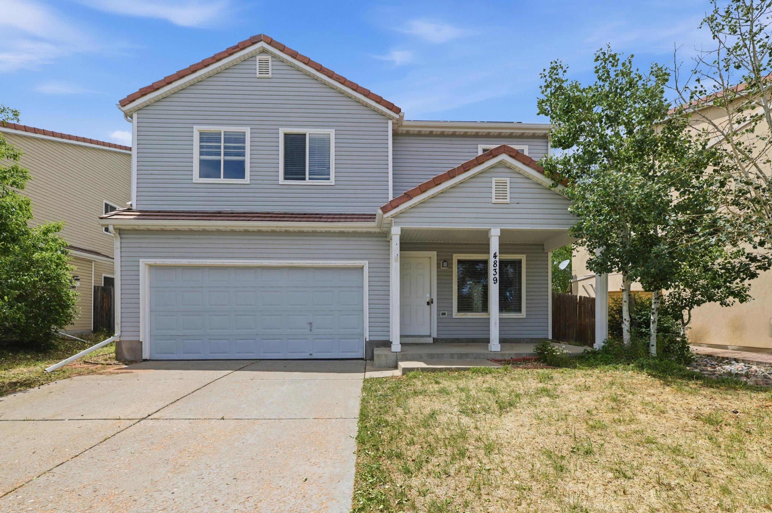 Single Family Home 4BR 2.1BA - 4839 Liverpool St, Denver, CO