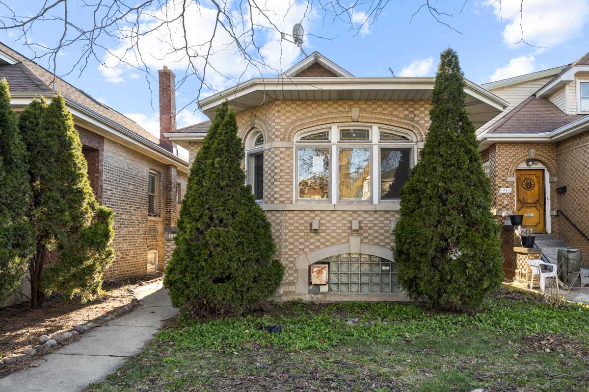 Single Family Home 5BR 1BA — 1748 N New England Ave, Chicago, IL