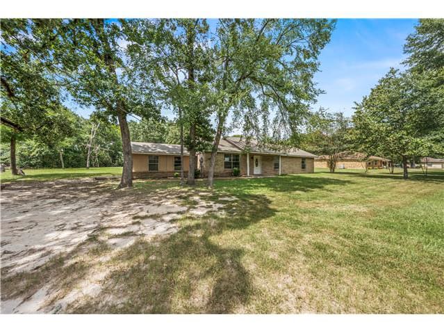 Photograph of 21 Wood Lodge Dr, Huntsville, TX 77320