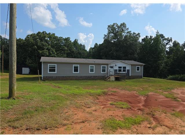 Manufactured Home 4BR 2BA - 525 Sewell Bottom Rd, Adamsville, TN