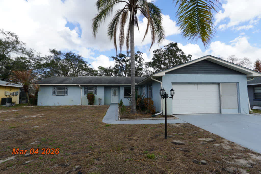 HUD Home — 2 Pine Run, Haines City, FL 33844 — photo 1