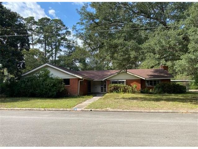 HUD Home — 1002 S College Ave, Cleveland, TX 77327 — photo 1