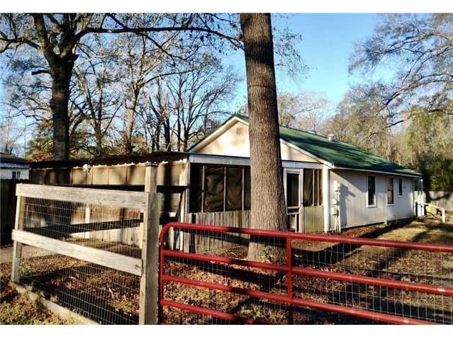 HUD Home — 211 Bobwhite Lane, Livingston, TX 77351 — photo 1