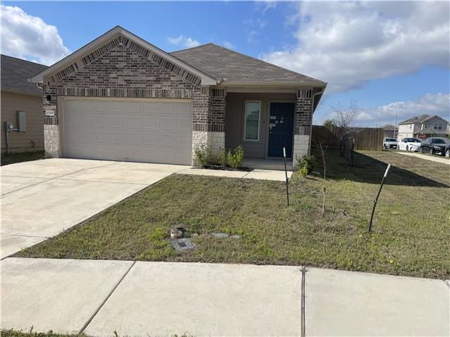 HUD Home — 12201 Token Trl, Elgin, TX 78621 — photo 1