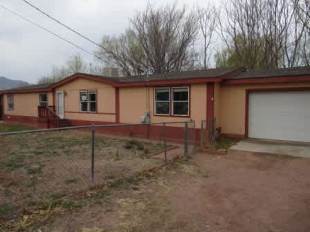HUD Home — 1306 Reed Ln, Canon City, CO 81212 — photo 1