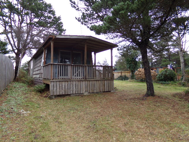 HUD Home — 8633 Sw Abalone St, South Beach, OR 97366 — photo 1