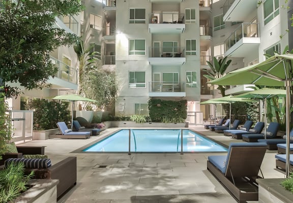 Pool, sundeck and lounge chairs at Olympic by Windsor, 936 S. Olive St, 90015