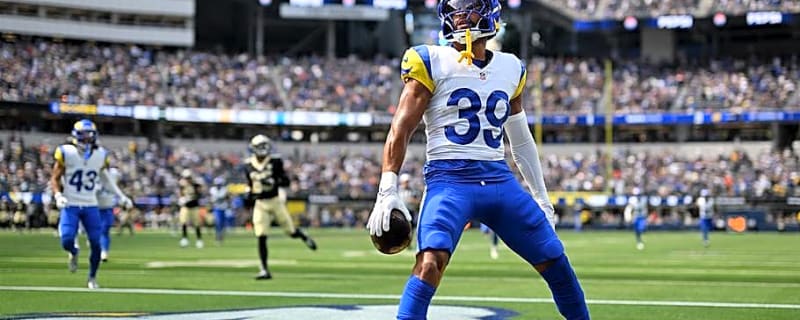 Ex-Husky Cook Serves Up 100-Yard Interception Return