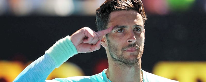 Lorenzo Musetti immediately reacts after winning his first ATP title in four years in Lyon
