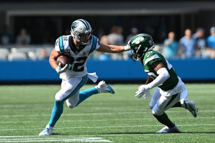 NFL Week 1 grades from around the league - NewsOpener McCaffrey's return buoys Darnold against ex-employer