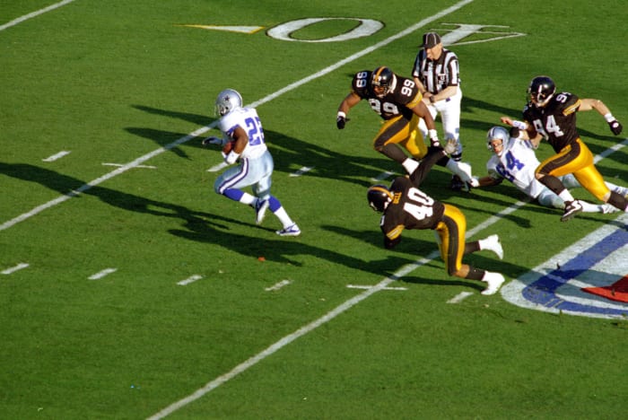 Helps Cowboys win third Super Bowl in four years