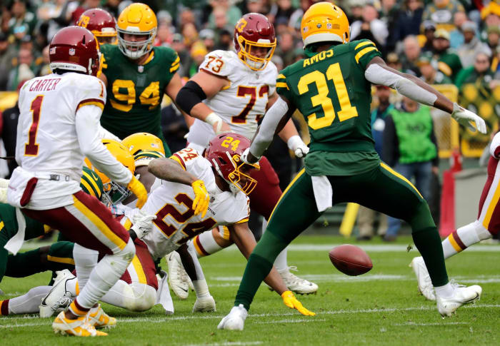 Washington folds in red zone, continues descent