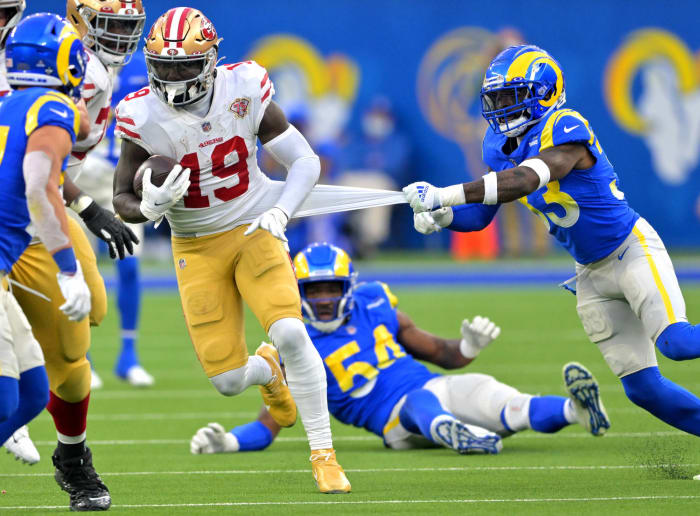 Star-stacked Rams pass defense folds