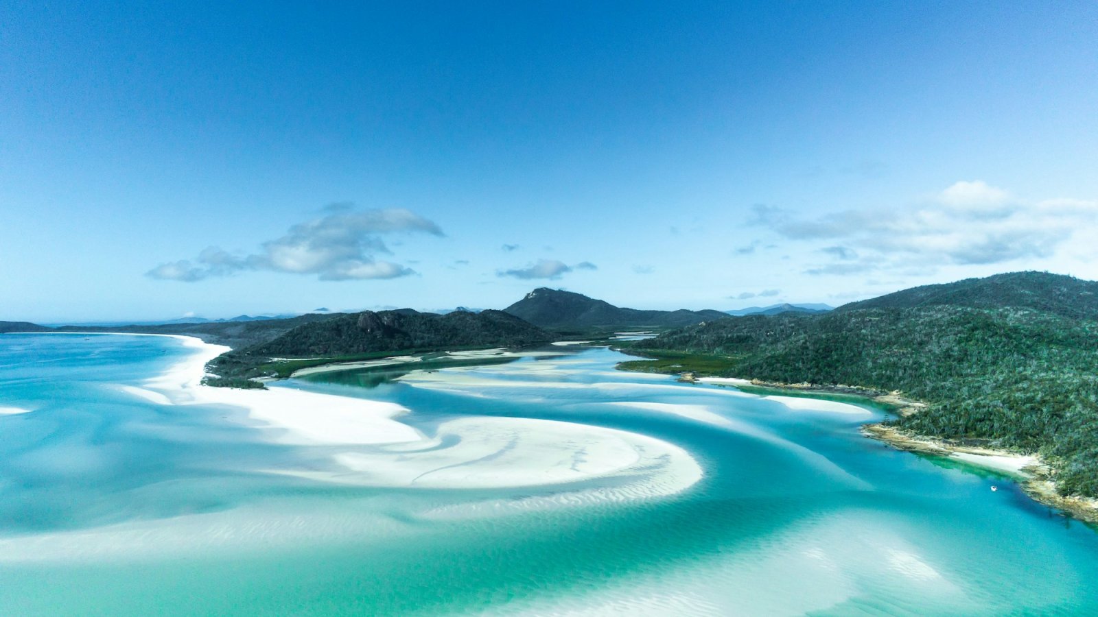 Arena blanca y aguas turquesas de Hill Inlet, islas Whitsunday, Australia