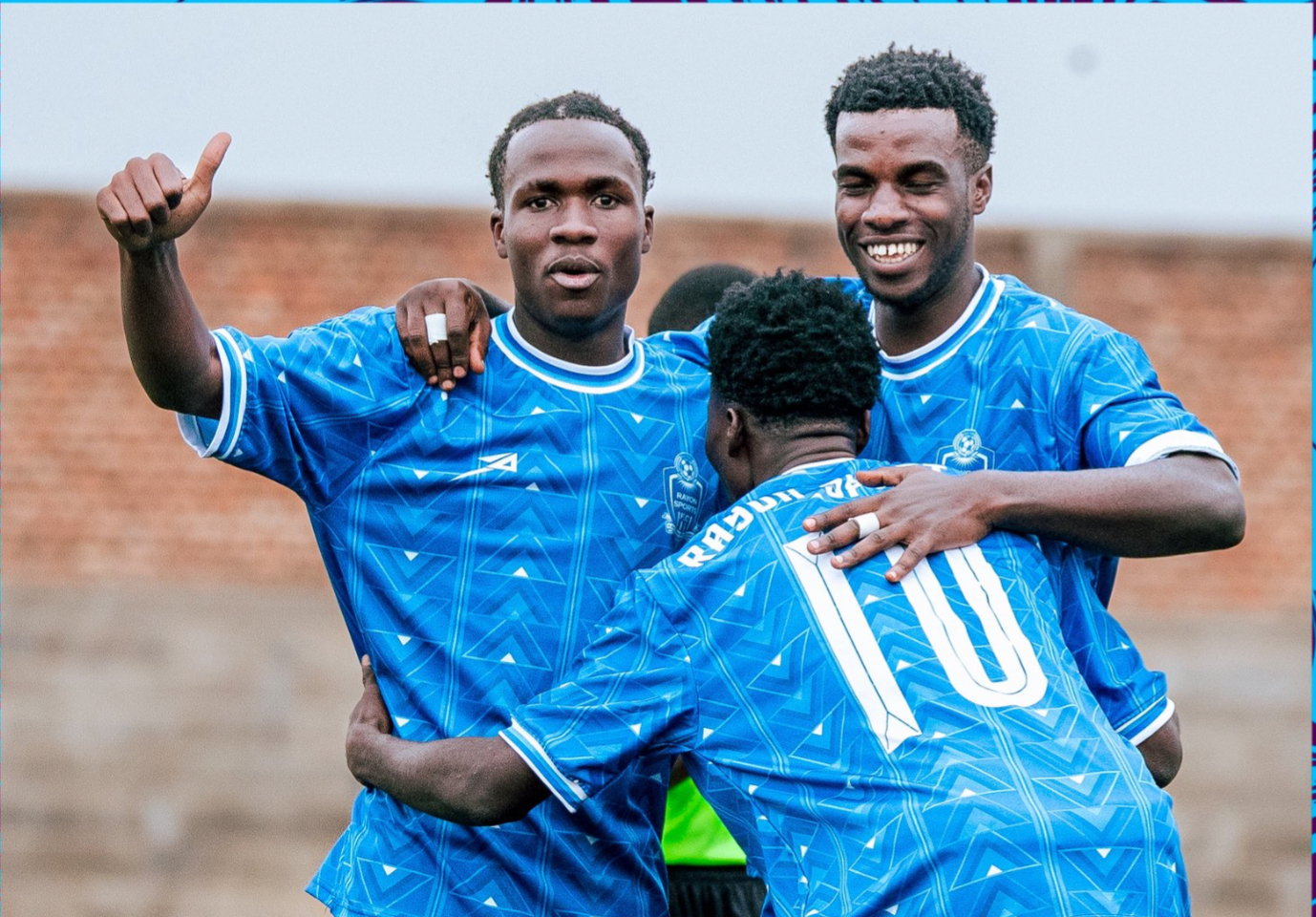 Rayon Sports FC players celebrating together