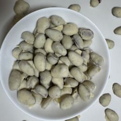 Karmel. migdał z jagodą w białej czekoladzie