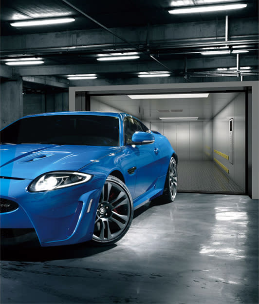 Car elevator for garage — Car elevator — Ceiling: Painted steel Ventilation: Circular fan Cabin Wall: Painted steel Cabin Door: Painted steel Handrail: None Floor: Chequered plate steel Door Opening: 2-Panels center Opening supplied by Rivet in Ethiopia