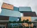 Macau Casinos Reopen After Typhoon Shutdown as GGR Forecast is Cut