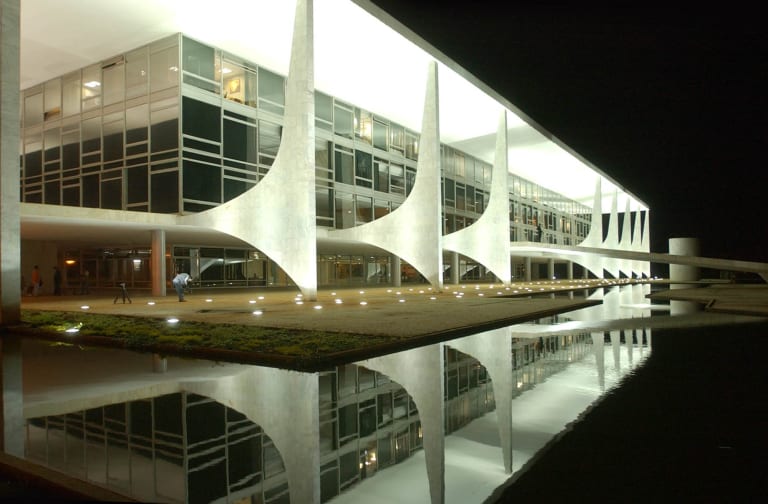 The Palácio do Planalto, seat of Brazil's presidency in Brasília, lit at night and reflected in its pool