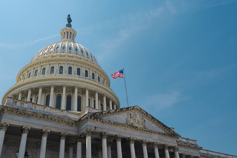 Us capitol dome flag blue sky