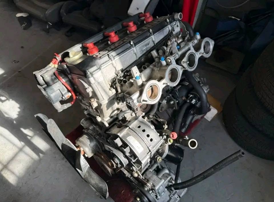 Vue de la pièce Moteur BMW E30 M3 S14 complet — boîte, ECU, faisceau inclus