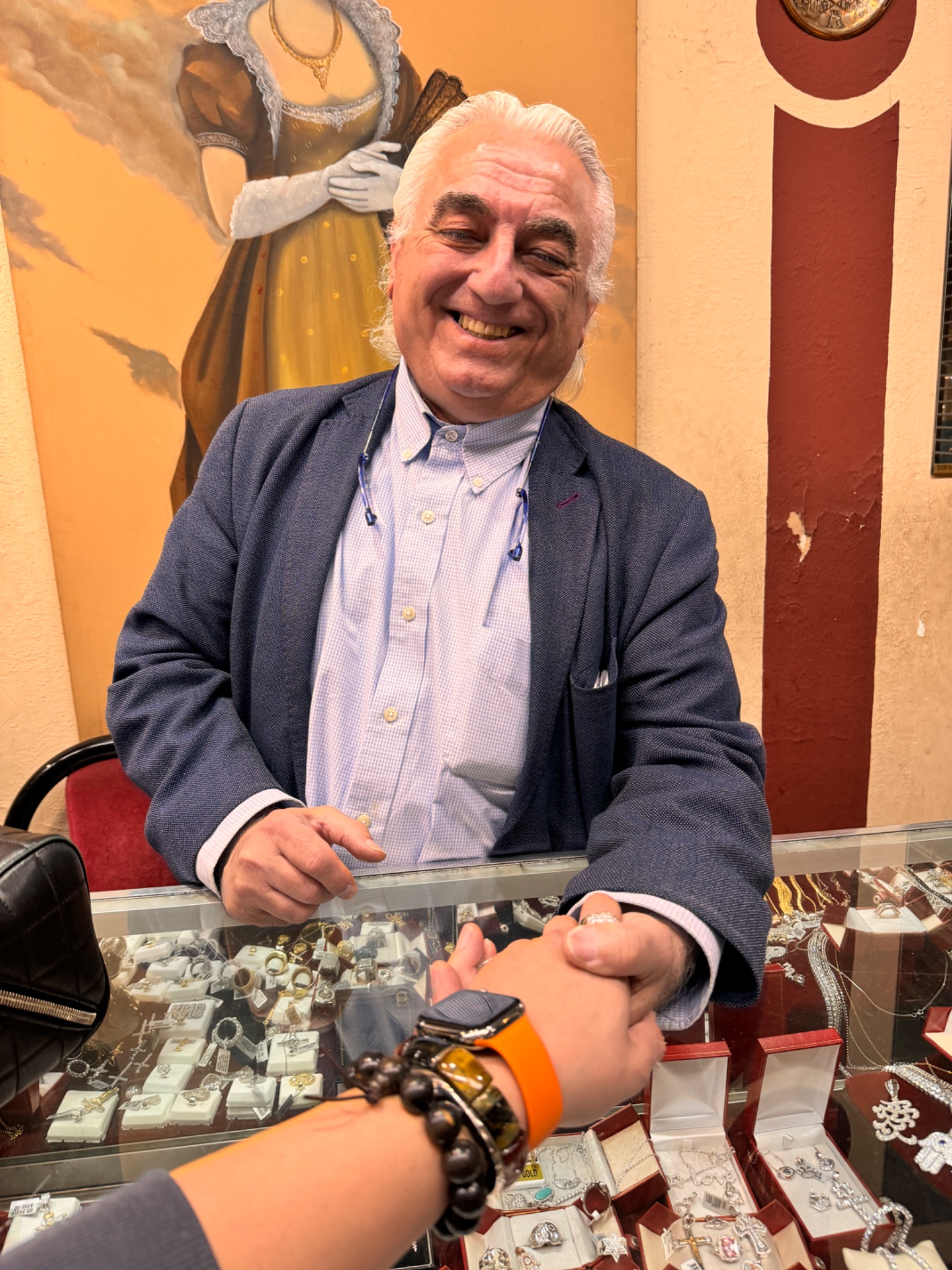 Sam behind the counter at Prestige Jewelry