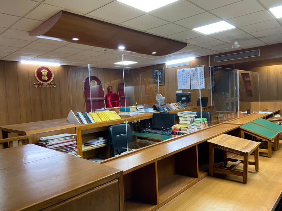 Courtroom wider view with wooden furniture