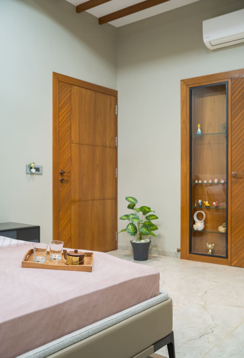 Bedroom interior with wooden door and cabinet