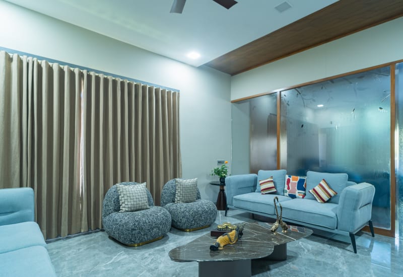 "Living room view with glass partition wall"