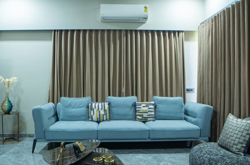 "Front view of contemporary blue sofa"