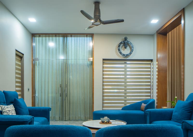 Modern living room with blue sofas