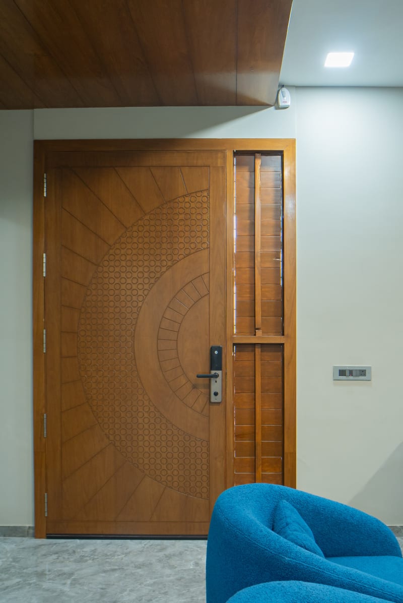 Carved wooden door with smart electronic lock