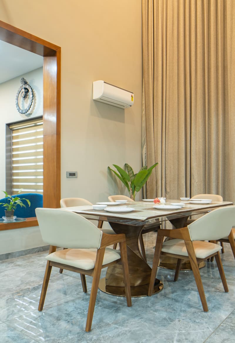 Modern dining table and wooden chairs