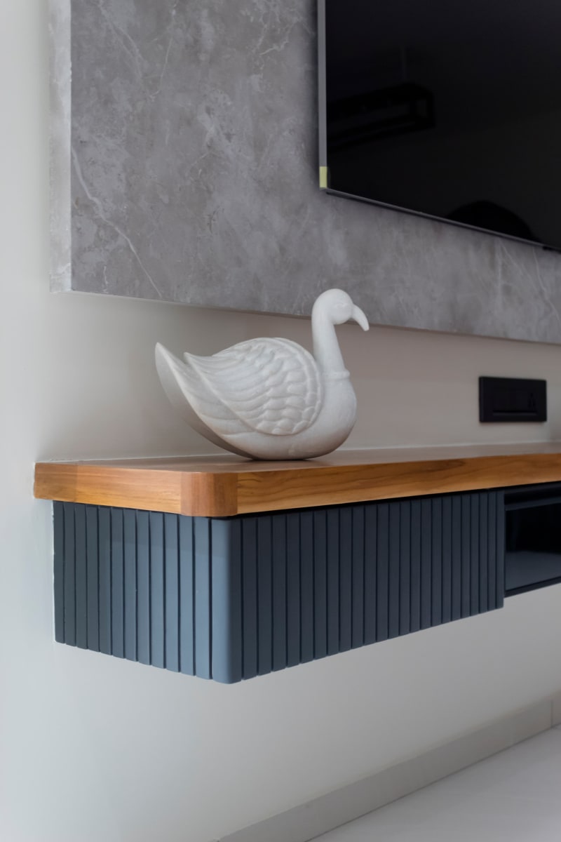 Floating TV console with swan showpiece