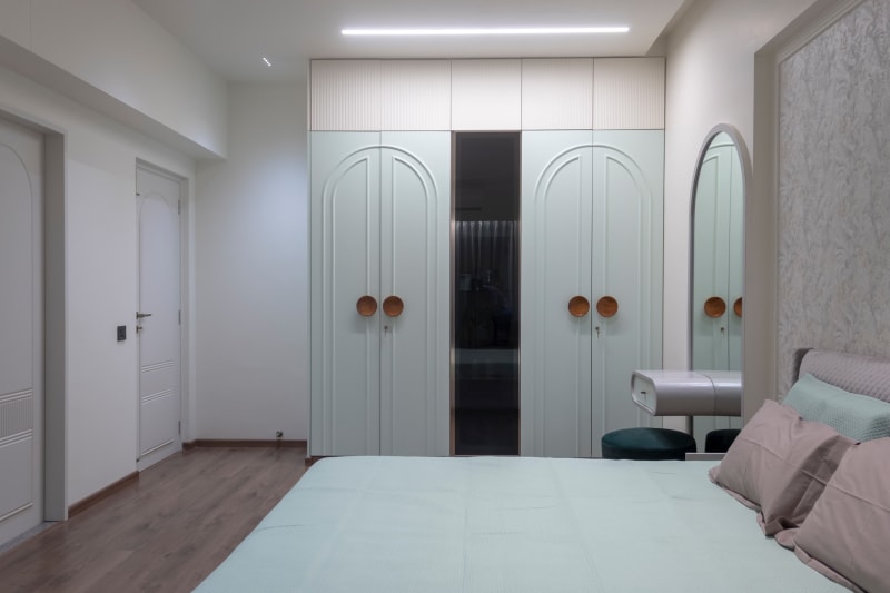 Spacious bedroom with wardrobe and dressing area