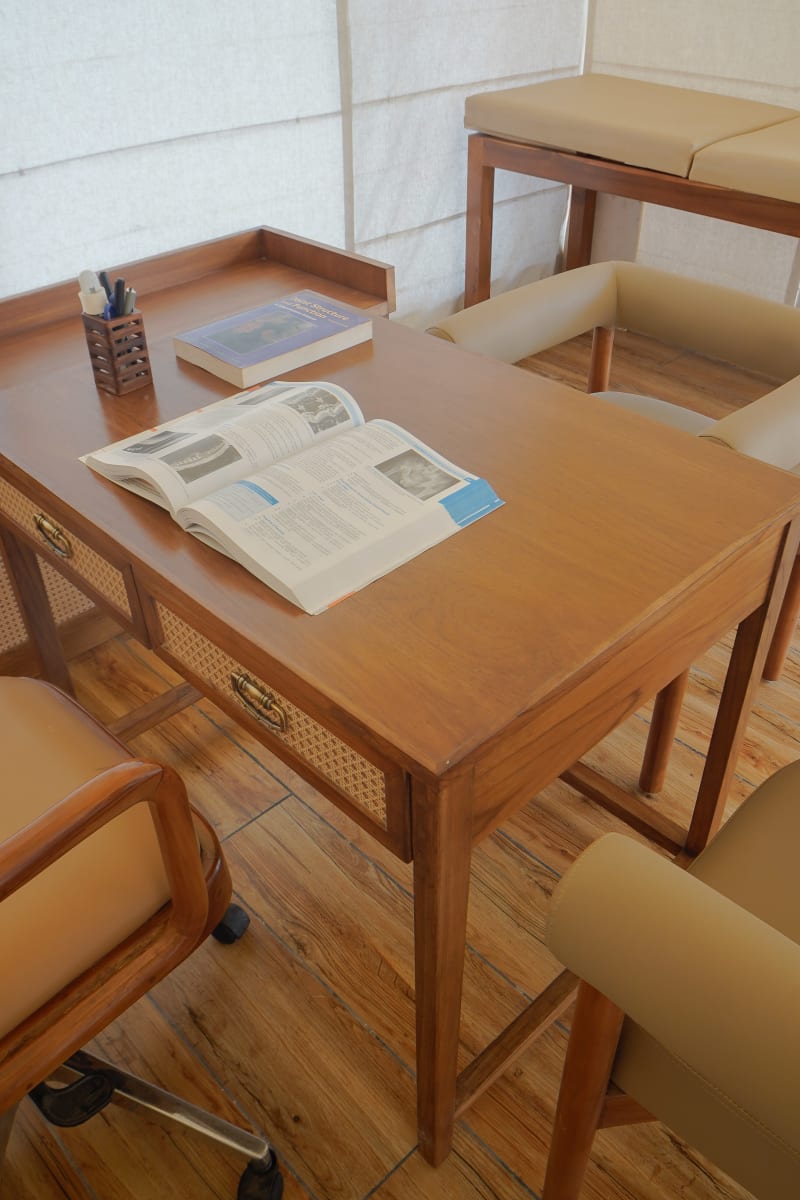 Consultation room with desk and chairs