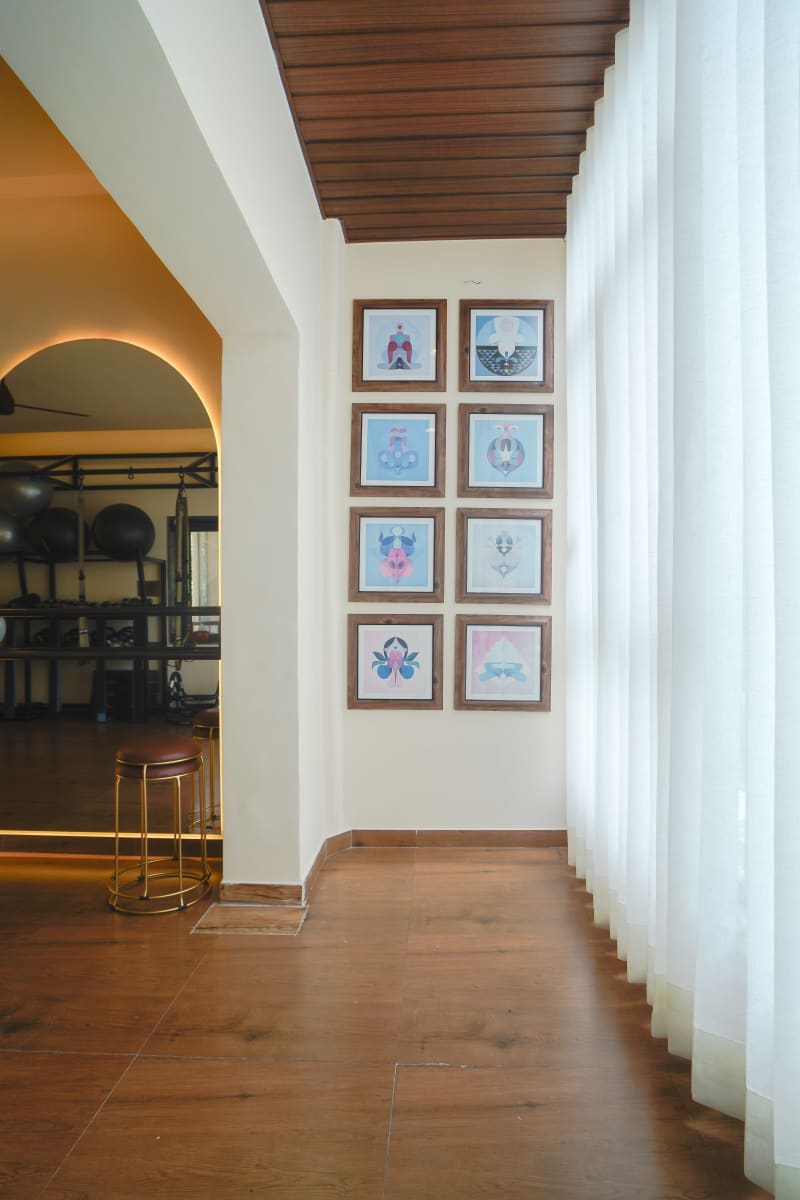 Hallway showing arched doorways and lights