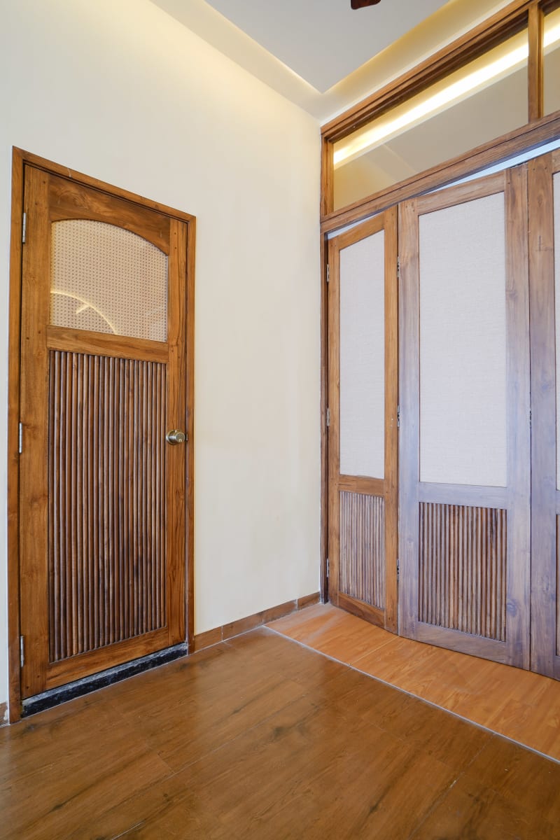 Detail of wooden door with cane panel
