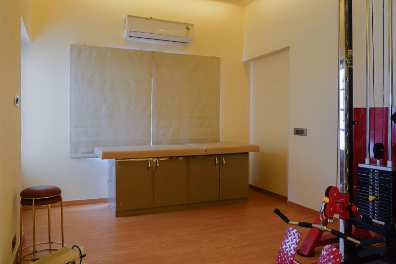 Treatment room with medical examination table