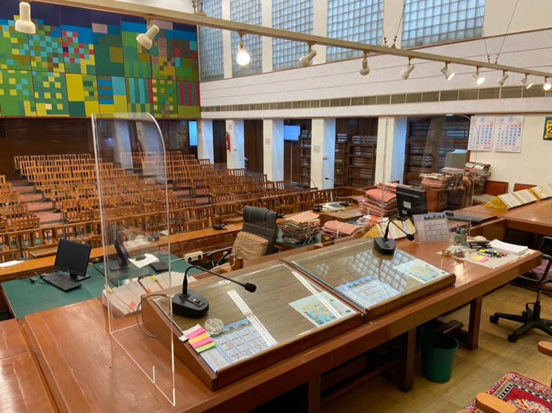 Courtroom interior with wooden seating gallery